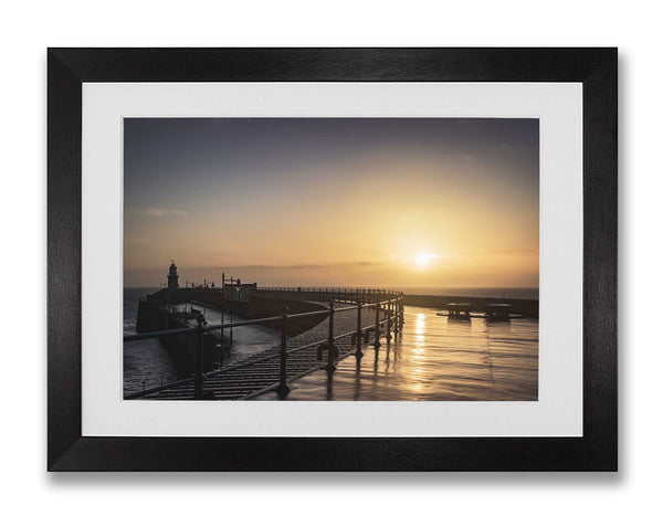 Sunrise over the Harbour Arm and English Channel